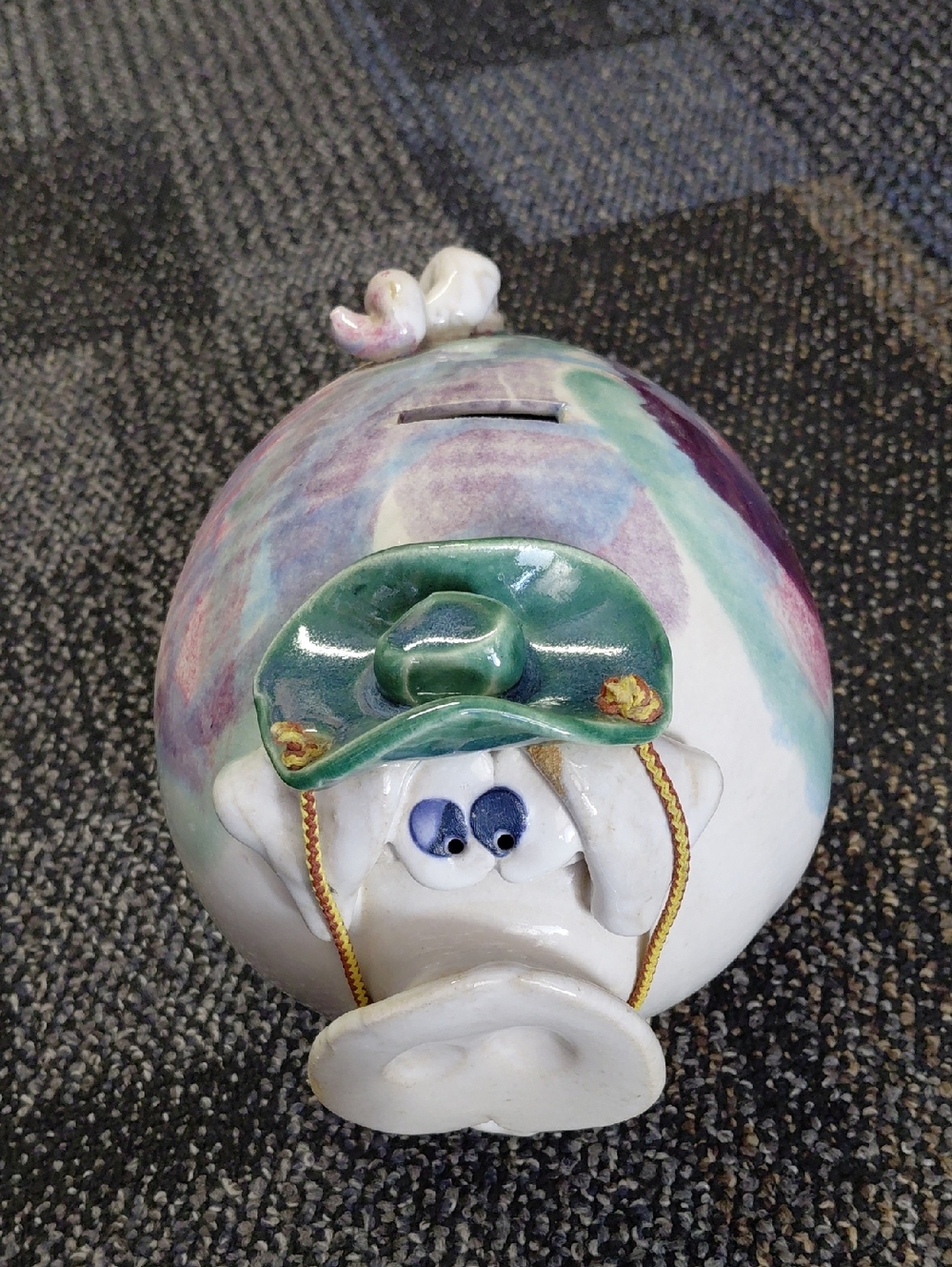 collectible, handcrafted artisan ceramic piggy bank featuring a whimsical pig